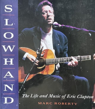 Item #1025237 SlowHand: The Life and Music of Eric Clapton. Mark Roberty