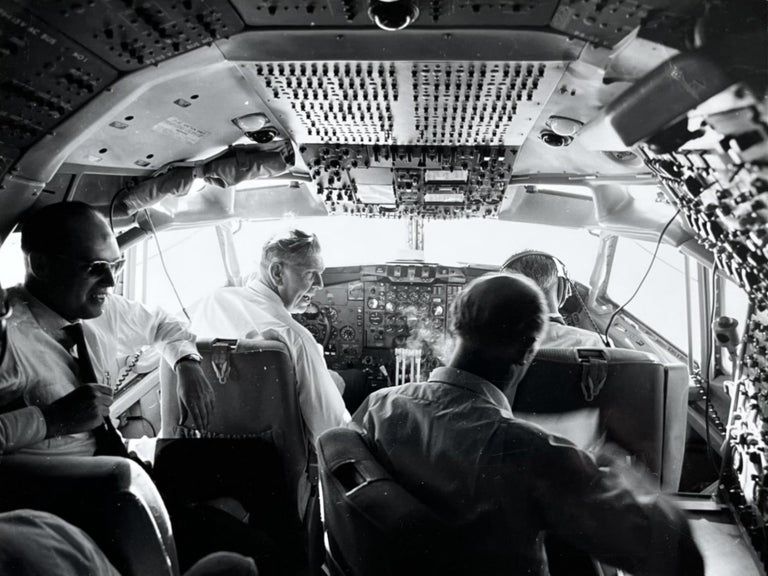 Item #227240 1960s Glossy Black and White Photo of a Lufthansa Airlines Four [4] Member Flight Crew in the Cockpit of a Boeing 707 airliner. Lufthansa Airlines.