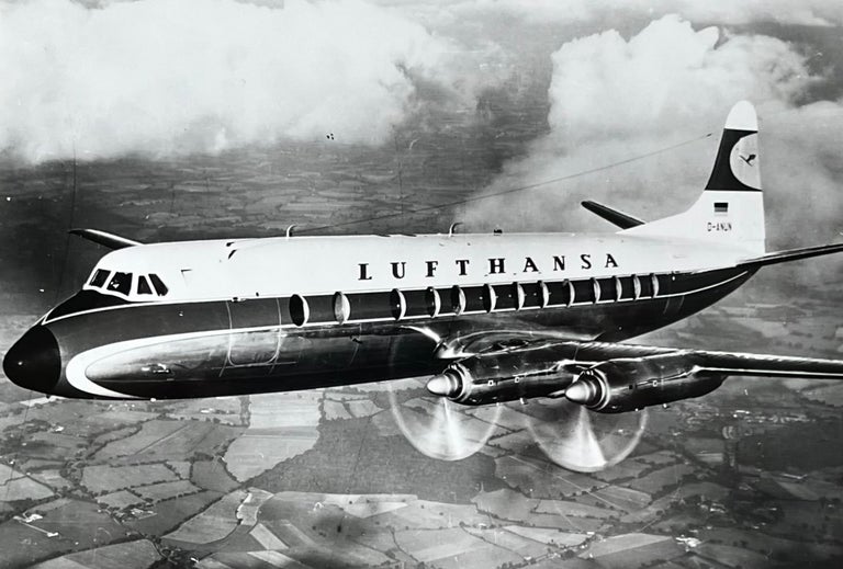 Item #227245 1960s Glossy Black and White Photo of a Lufthansa Vickers V-814 Vicount Jetliner In Flight. Lufthansa Airlines.