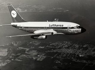 Item #227251 1970s Glossy Black and White Photo of a Lufthansa Boeing 737 "City Jet" In Flight....