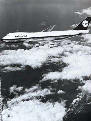 Item #227253 1970s Glossy Black and White Photo of a Lufthansa Boeing 747-30 In-Flight. Lufthansa...