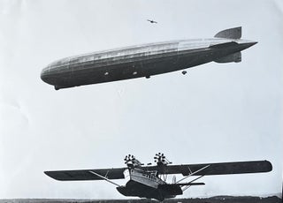 Item #227258 1970s Glossy Black and White Photo of a Lufthansa Dornier Superwal with a Zeppelin....