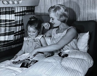 Item #227261 1960s Glossy Black and White Photo of a Mother and Child on a Lufthansa Flight....