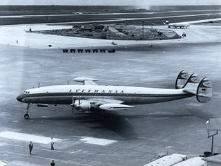Item #227263 1970s Glossy Black and White Photo of a Lufthansa Super Constellation (L-1049G) Jet...