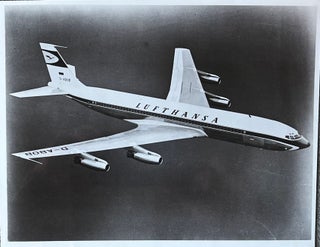 Item #227267 1960s Glossy Black and White Photo of a Lufthansa Boeing 707 Jetliner In Flight....