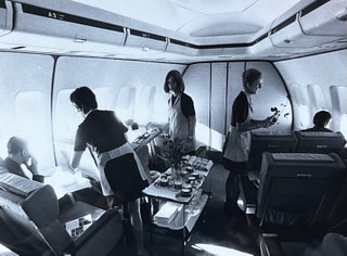 Item #227274 1970s Glossy Black and White Photo of Flight Attendants Serving a Meal to Lufthansa...