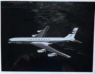 Item #22823 1970s Glossy Black and White Photo of a Lufthansa Boeing 737 "City Jet" In Flight....